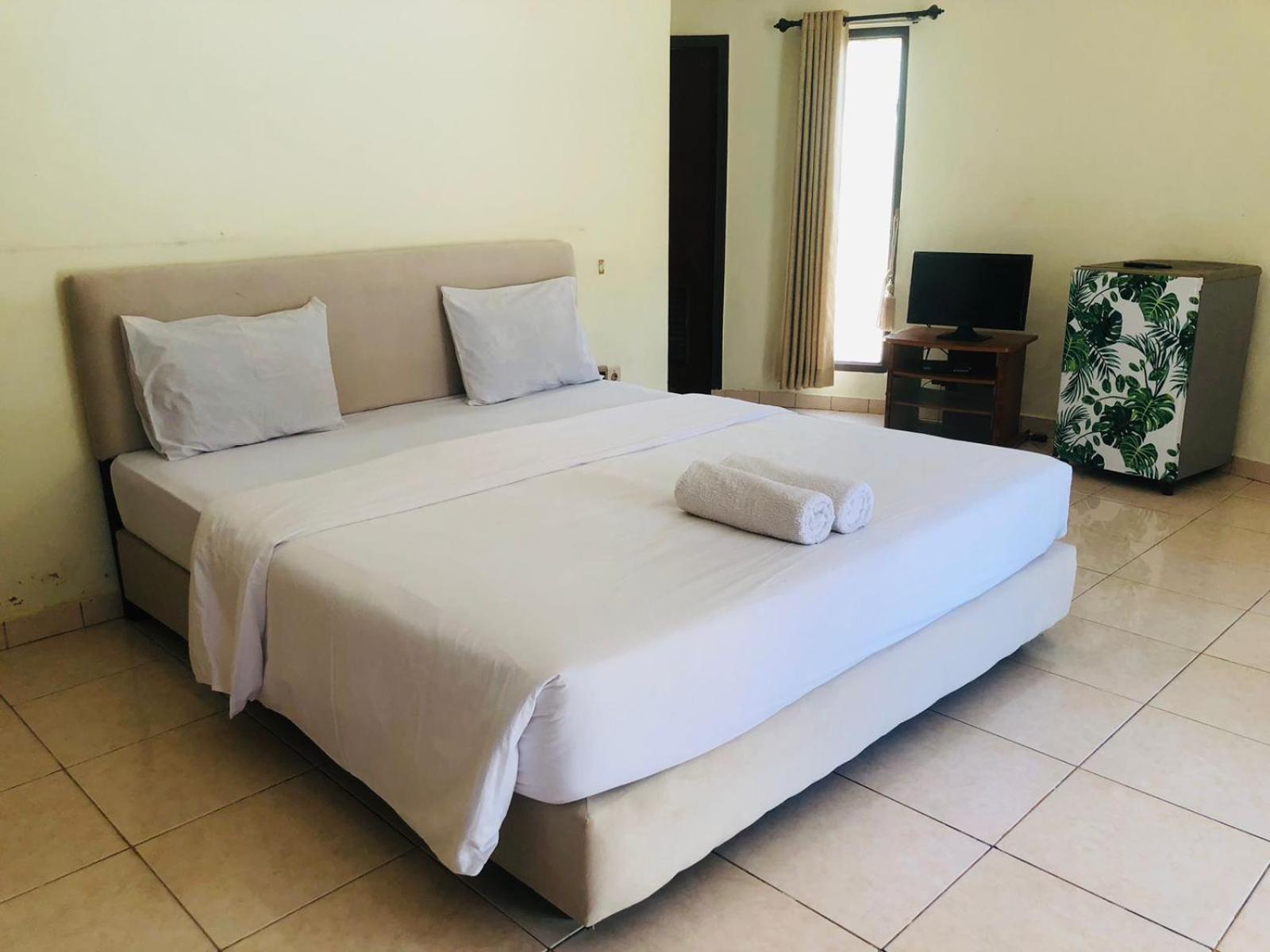 Gguesthouse Kuta  ภายนอก รูปภาพ